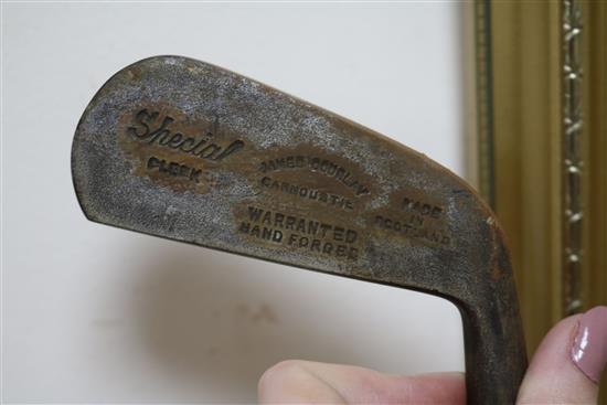 Two wooden drivers by Armstrong & Co and Paxton, a gun metal putto signed Jacques, 7 other and a golf ball